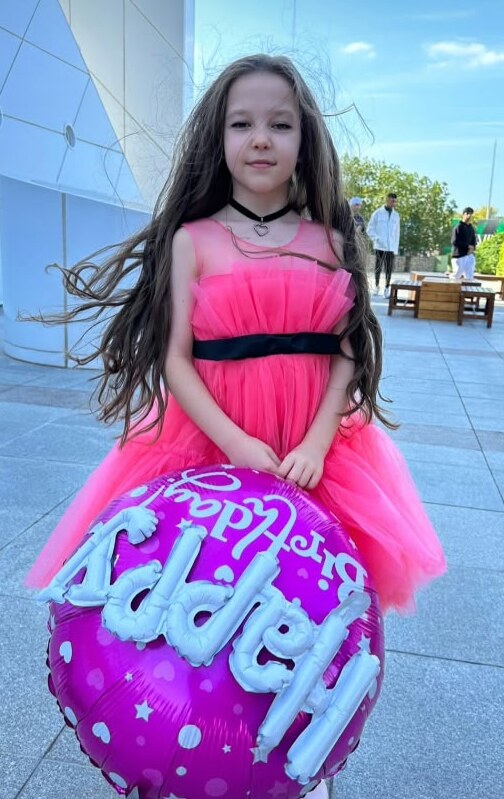 Happy birthday in hot-pink tulle.