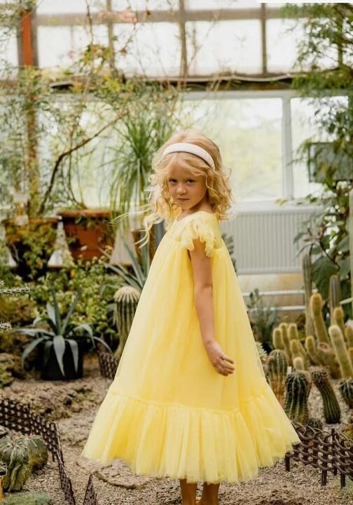 Greenhouse photoshoot in our yellow tulle dress.
